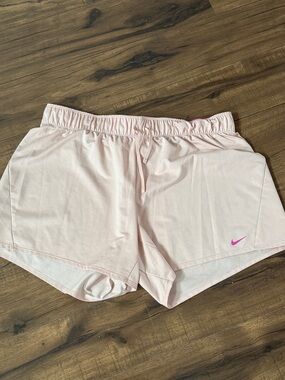 Nike Women’s Light Pink Athletic Shorts with Pink Swoosh